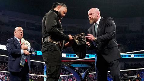 Triple H presents Reigns a new Undisputed WWE Universal Title  .
